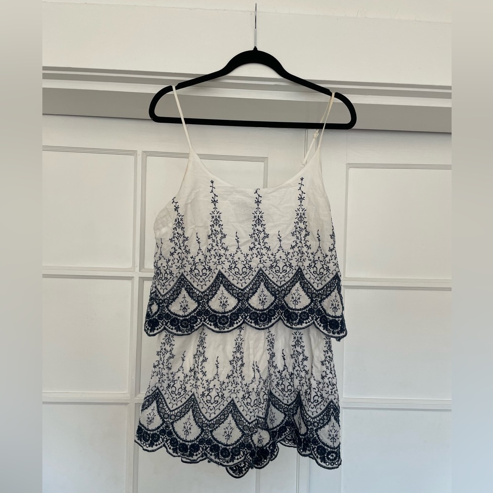 Navy and white embroidered romper